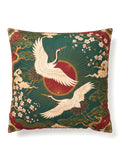 A square decorative throw pillow featuring a traditional Japanese-style print with two white cranes, cherry blossoms, clouds, and a red sun motif on a dark green background.