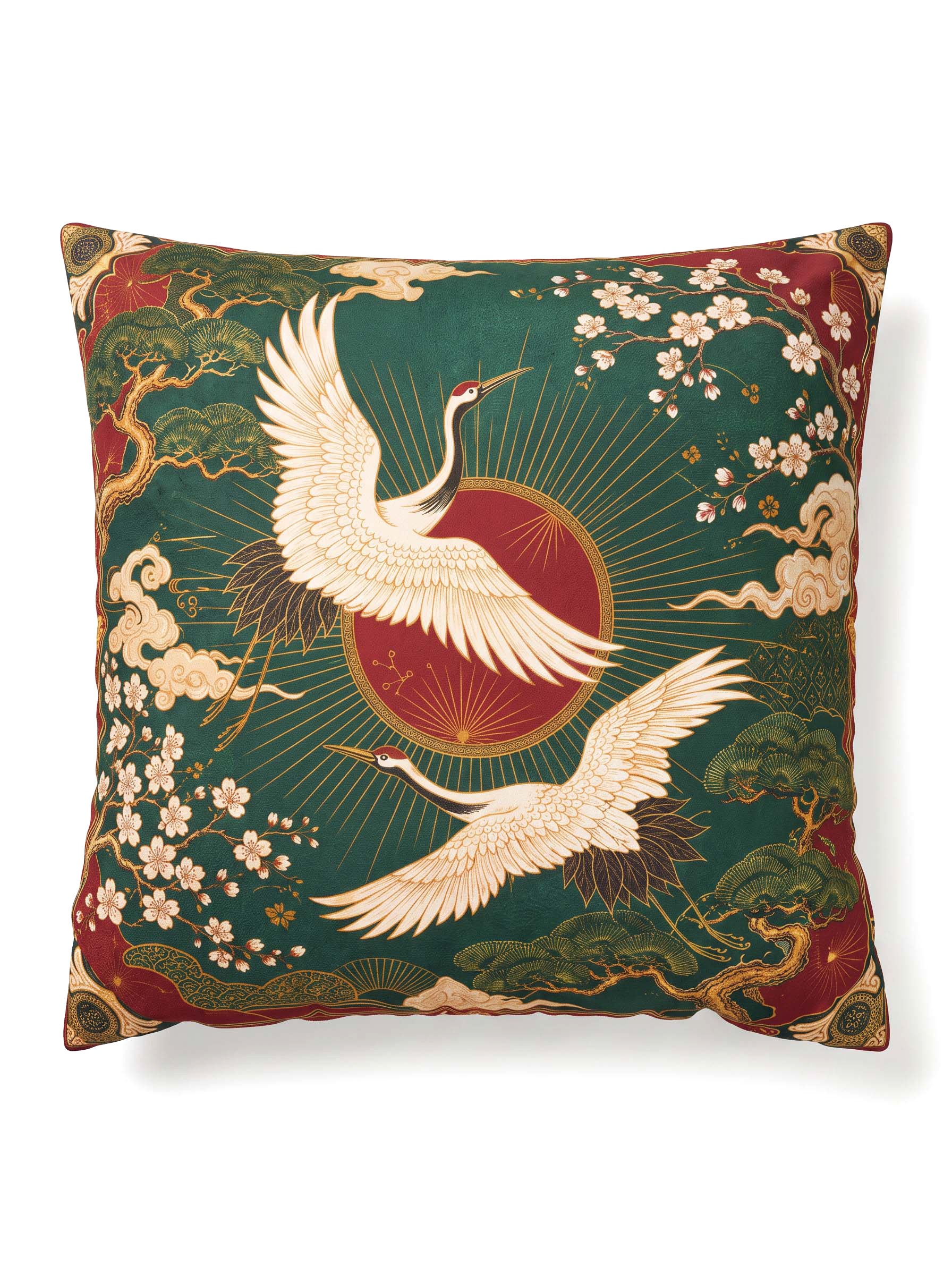 A square decorative throw pillow featuring a traditional Japanese-style print with two white cranes, cherry blossoms, clouds, and a red sun motif on a dark green background.